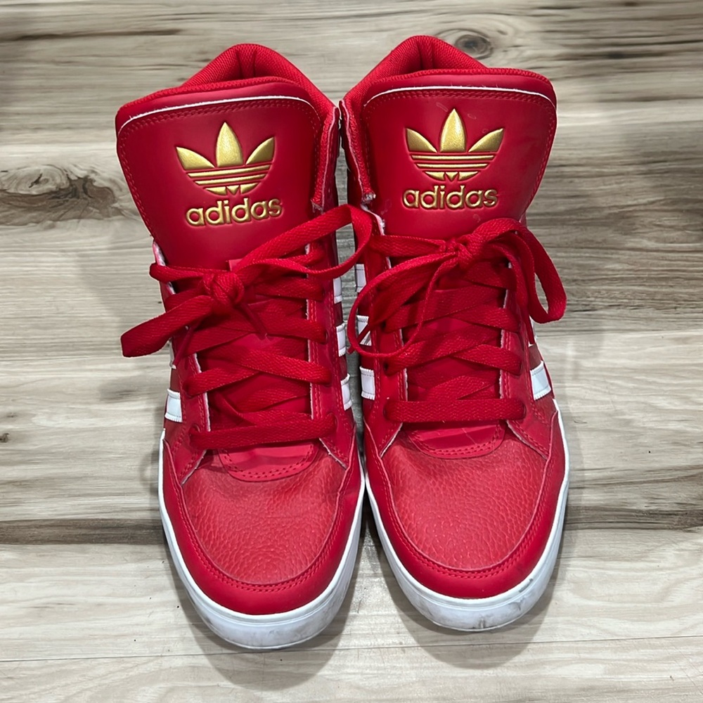 Red high top Adidas sneakers
